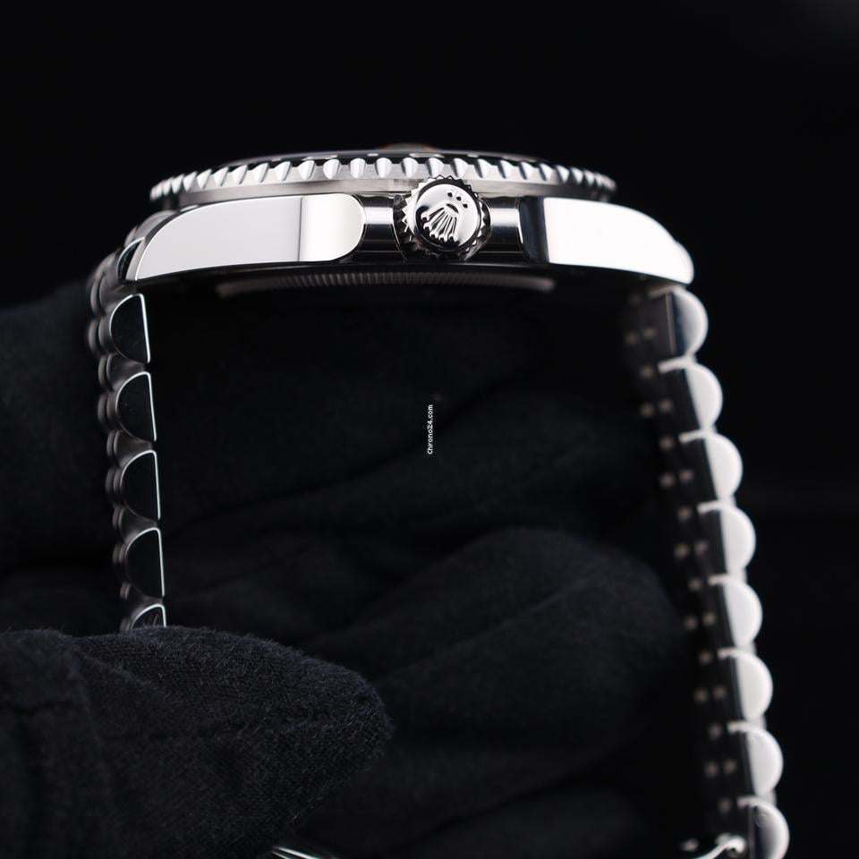 Rolex GMT-Master II watch with an Oystersteel and yellow gold bracelet and a black dial.