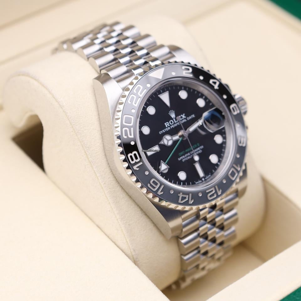 Rolex GMT-Master II watch with an Oystersteel and yellow gold bracelet and a black dial.