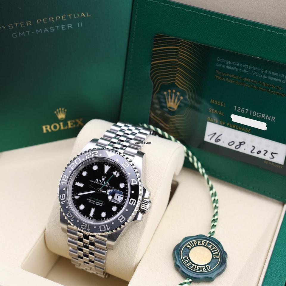Rolex GMT-Master II watch with an Oystersteel and yellow gold bracelet and a black dial.