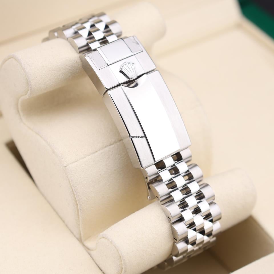 Rolex GMT-Master II watch with an Oystersteel and yellow gold bracelet and a black dial.