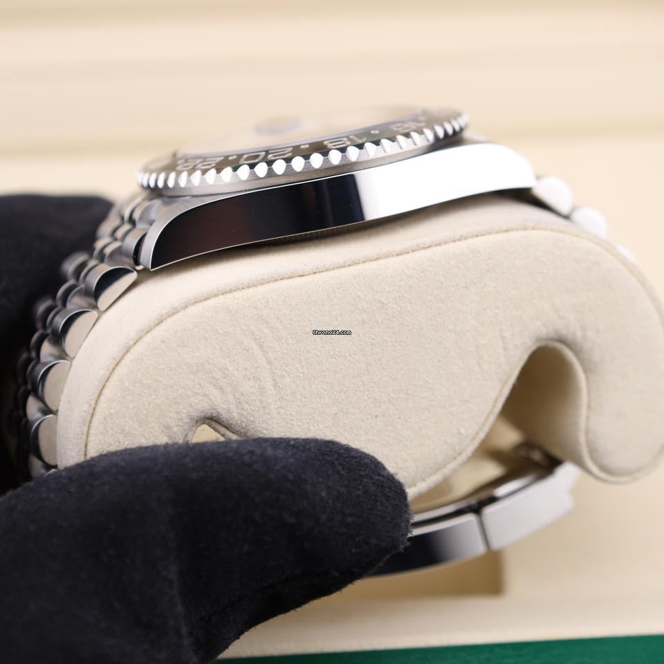 Rolex GMT-Master II watch with an Oystersteel and yellow gold bracelet and a black dial.