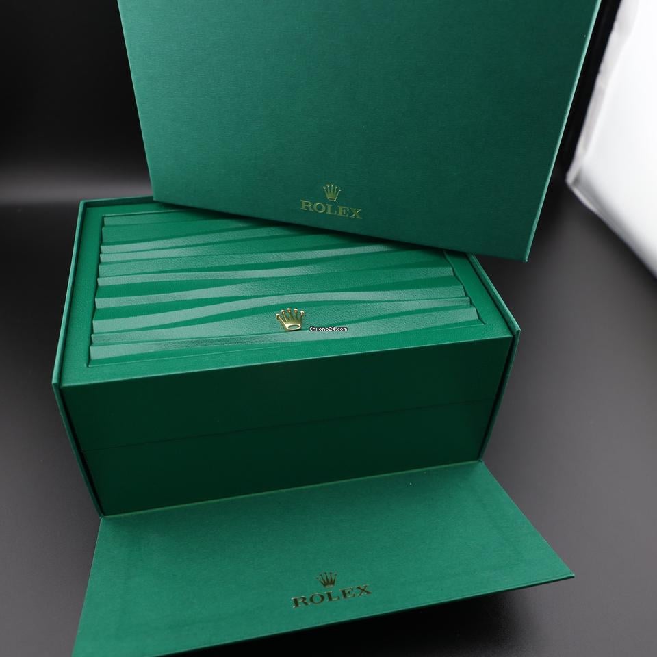 Rolex GMT-Master II watch with an Oystersteel and yellow gold bracelet and a black dial.