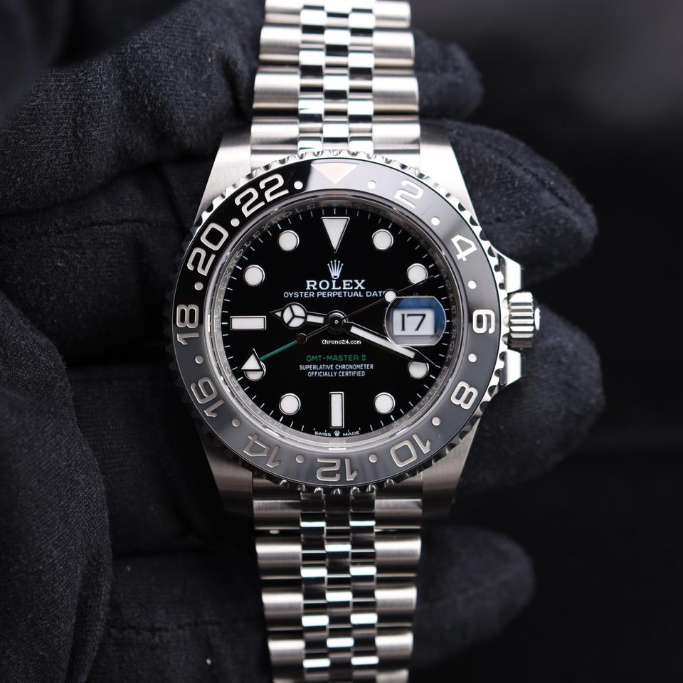 Rolex GMT-Master II watch with an Oystersteel and yellow gold bracelet and a black dial.