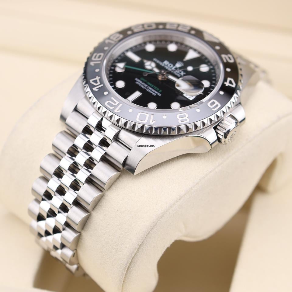 Rolex GMT-Master II watch with an Oystersteel and yellow gold bracelet and a black dial.