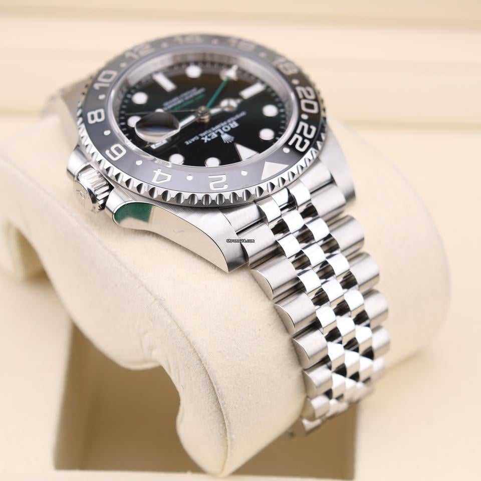 Rolex GMT-Master II watch with an Oystersteel and yellow gold bracelet and a black dial.